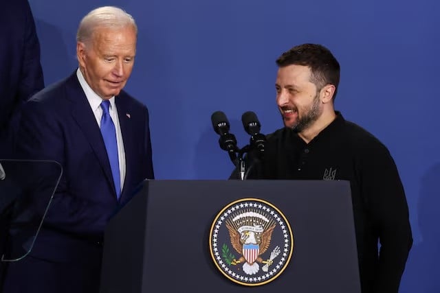 ukraine s president volodymyr zelenskiy and us president joe biden react as they attend a ukraine compact meeting on the sidelines of the nato s 75th anniversary summit in washington us on july 11 2024 photo reuters