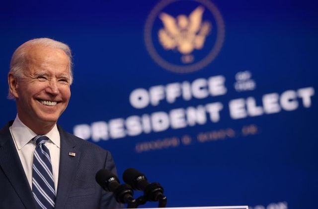 us president elect joe biden smiles as he speaks about health care and the affordable care act obamacare at the theater serving as his transition headquarters in wilmington delaware us november 10 2020 photo reuters