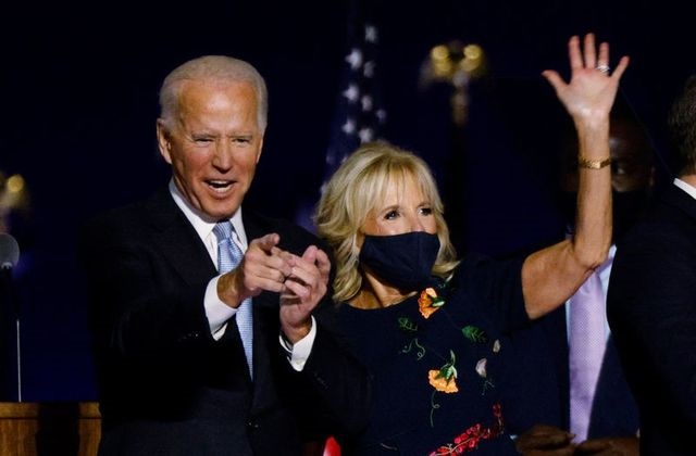 Democratic 2020 US presidential nominee Joe Biden and his wife Jill celebrate onstage at his election rally, after the news media announced that Biden has won the 2020 US presidential election over President Donald Trump, in Wilmington, Delaware, US, November 7, 2020. PHOTO: REUTERS