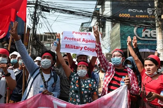 demonstrators show the three finger salute to protest against the military coup and demand the release of elected leader aung san suu kyi in yangon myanmar february 6 2021 photo reuters demonstrators show the three finger salute to protest against the military coup and demand the release of elected leader aung san suu kyi in yangon myanmar february 6 2021 photo reuters