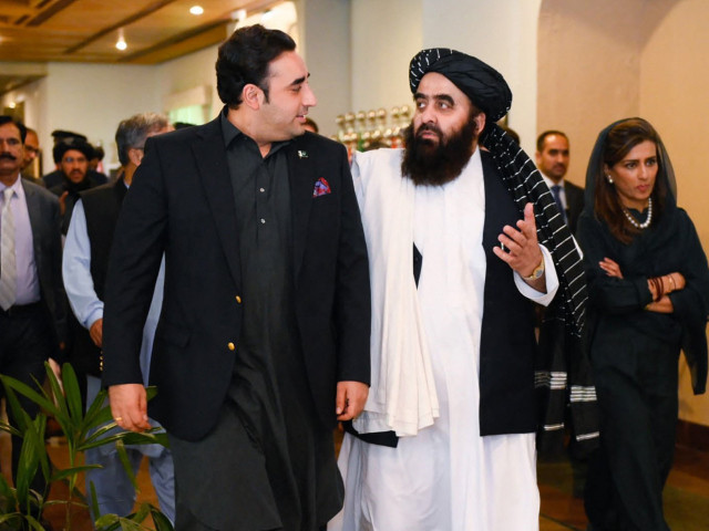 foreign minister bilawal bhutto zardari and minister of state for foreign affairs hina rabbani khar walk with afghanistan s foreign minister amir khan muttaqi during a meeting in islamabad photo afp