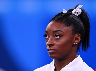 biles says she should have quit before tokyo games