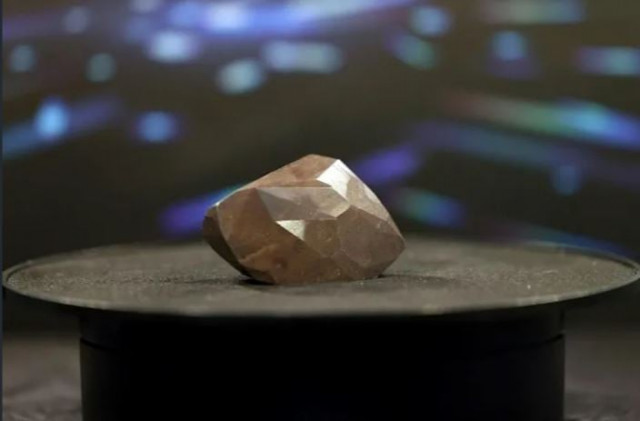 the rare black or carbanado diamond is believed to have been created when a meteorite or an asteroid hit earth more than 2 6 billion years ago photo afp