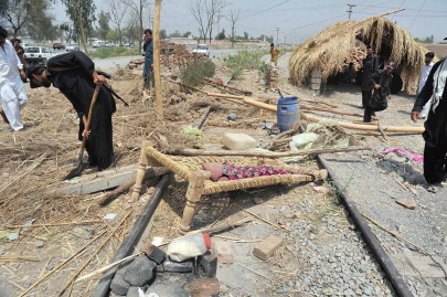 dozens of militants attack peshawar checkpoint