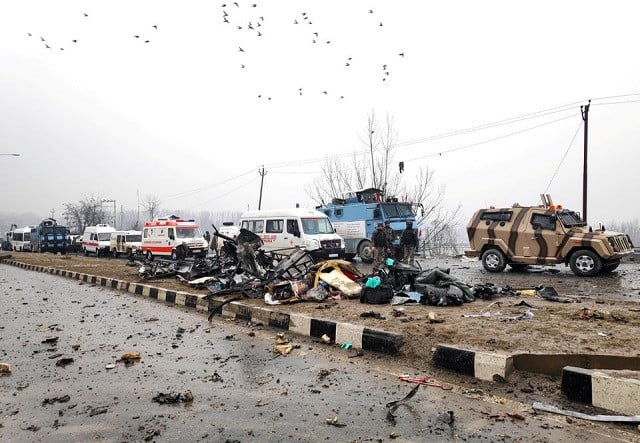 indian soldiers examine the debris after an explosion in lethpora in pulwama district february 14 2019 photo reuters