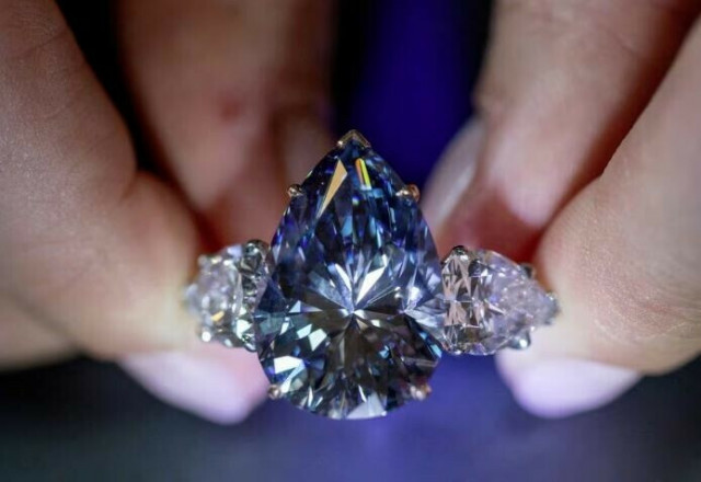 largest vivid blue diamond bleu royal sells for nearly 44 million at christie s auction largest vivid blue diamond bleu royal sells for nearly 44 million at christie s auction