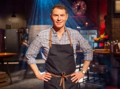 bobby flay admits he s still kind of new to dating after recent breakup
