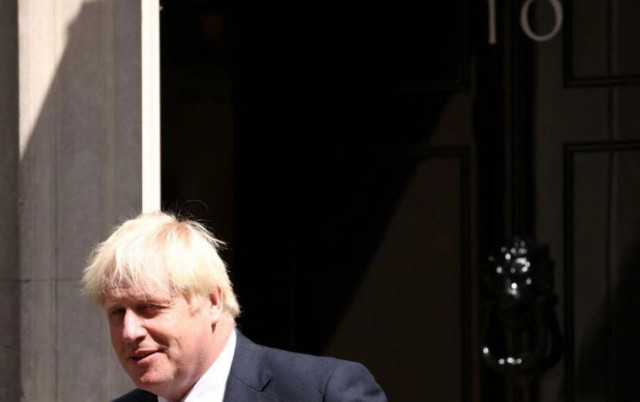 former british prime minister boris johnson walks outside downing street in london britain july 20 2022 photo reuters former british prime minister boris johnson walks outside downing street in london britain july 20 2022 photo reuters