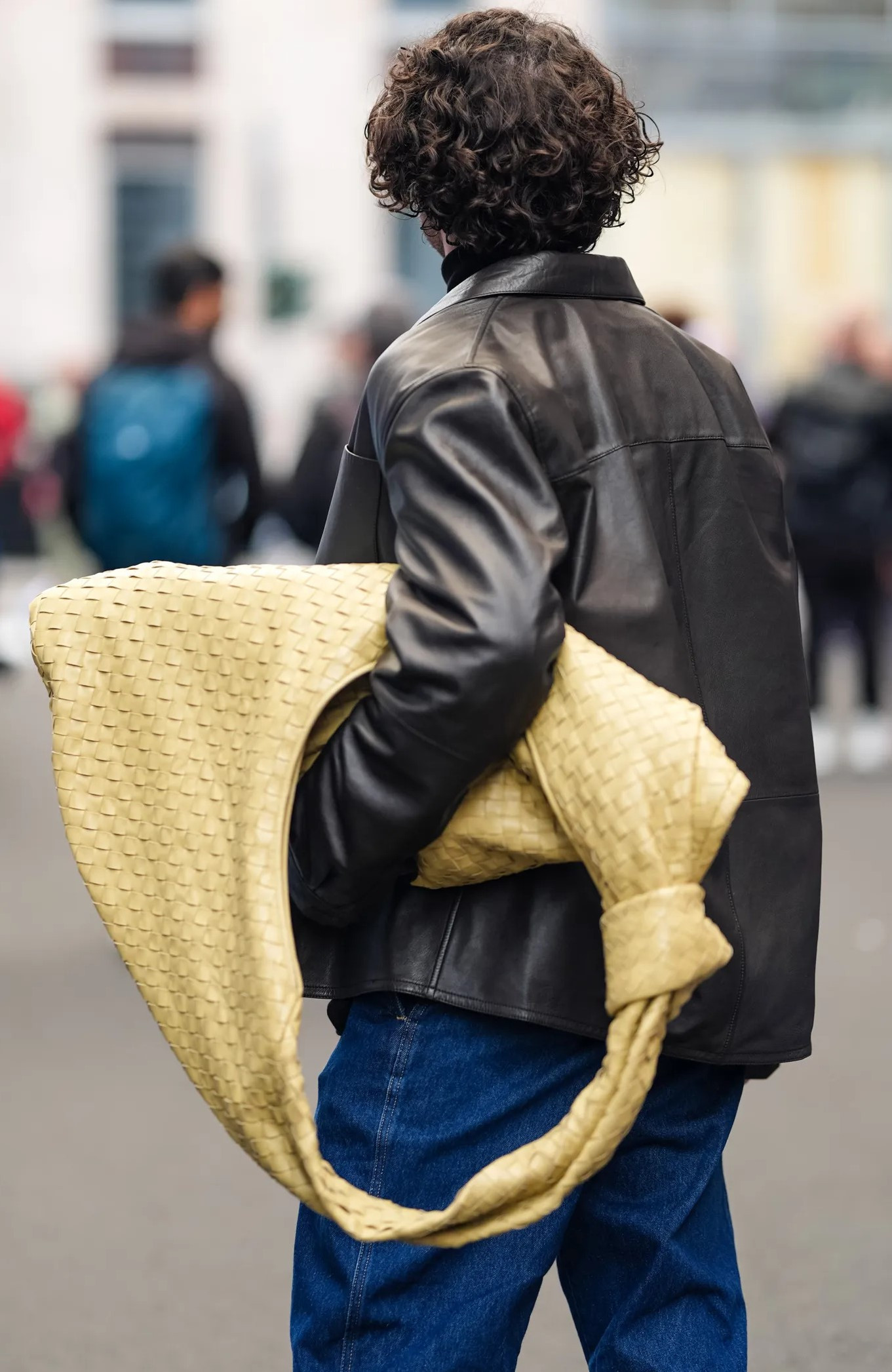 An oversized Bottega Veneta bag spotted in Milan in 2024 (Edward Berthelot/Getty Images)