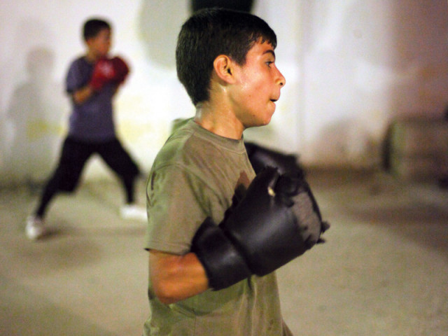 lyari s young boxers keeping the fight inside the ring lyari s young boxers keeping the fight inside the ring