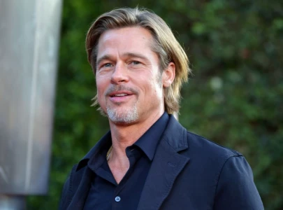 brad pitt and his new girlfriend ines de ramon share a beachside stroll in santa barbara