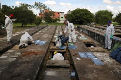 brazil exhumes old graves to make space for surging covid 19 burials