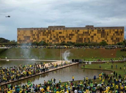 brazil police amass at camp of bolsonaro s backers after capital stormed brazil police amass at camp of bolsonaro s backers after capital stormed