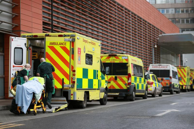 healthcare workers transport a patient at the royal london hospital as the spread of the coronavirus disease covid 19 continues in london britain january 26 2021 photo reuters file healthcare workers transport a patient at the royal london hospital as the spread of the coronavirus disease covid 19 continues in london britain january 26 2021 photo reuters file