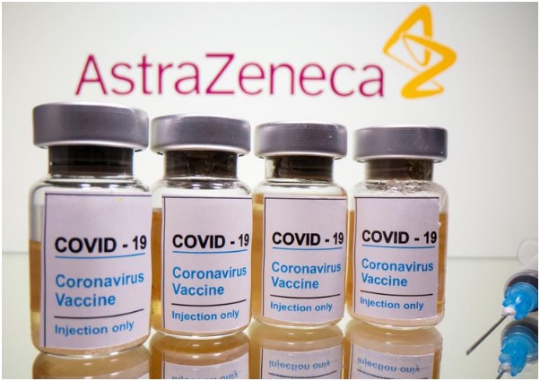 vials with a sticker reading covid 19 coronavirus vaccine injection only and a medical syringe are seen in front of a displayed astrazeneca logo in this illustration taken october 31 2020 photo reuters file