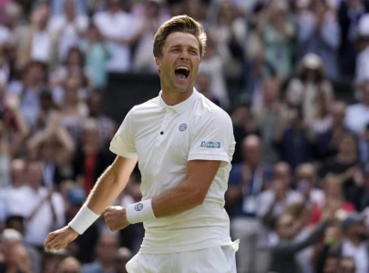 broady conquers demons to upset ruud