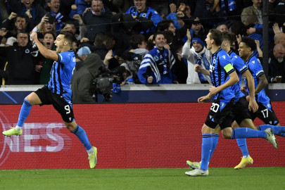 brugge beat atletico as griezmann blows penalty
