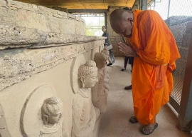 buddhist devotees explore heritage sites