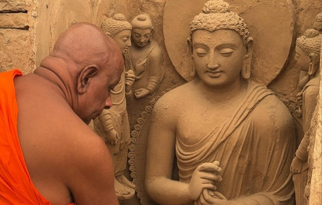 buddhist leaders from various countries visited the taxila museum and performed religious rituals photo express