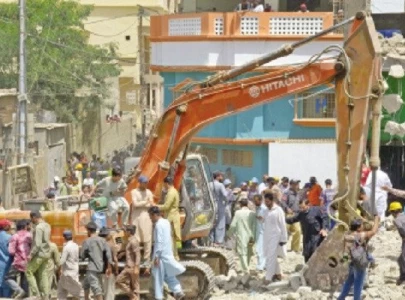building collapse during demolition drive leaves four injured in karachi