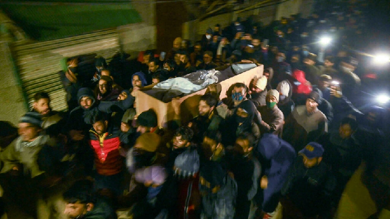 mourners carry the coffin of one of the two civilians killed during a security operation by the authorities in iiojk photo afp