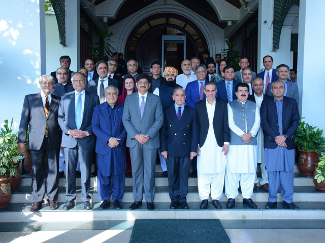 prime minister muhammad shehbaz sharif in a group photo with members and special invitees of the 50th meeting of the council of common interests in islamabad on 5 august 2023 photo pid