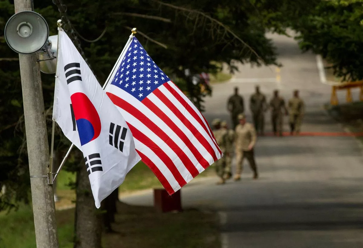 the south korean and american flags fly next to each other at yongin south korea august 23 2016 picture taken on august 23 2016 courtesy ken scar u s army handout via reuters the south korean and american flags fly next to each other at yongin south korea august 23 2016 picture taken on august 23 2016 courtesy ken scar u s army handout via reuters