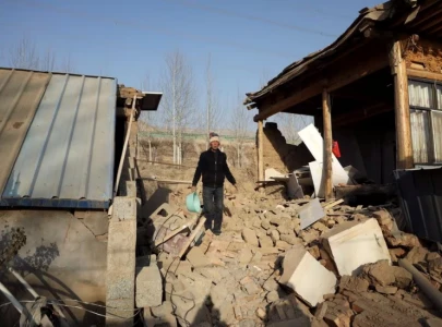 chinese earthquake victims pulled to safety in subfreezing weather