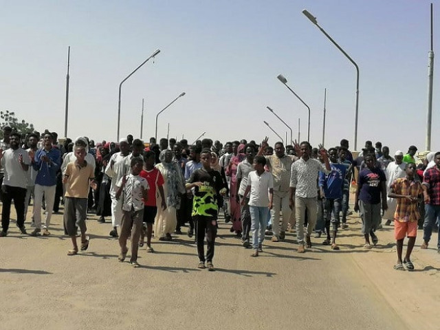sudanese demonstrators march and chant during a protest against the military takeover in atbara sudan october 27 2021 in this social media image photo reuters sudanese demonstrators march and chant during a protest against the military takeover in atbara sudan october 27 2021 in this social media image photo reuters
