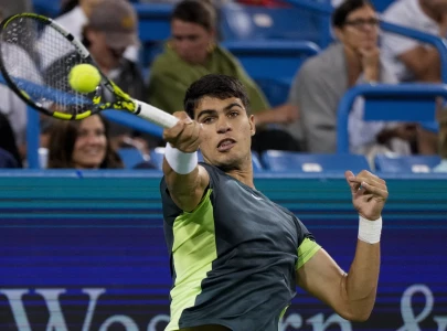 alcaraz battles through rain garcia out alcaraz battles through rain garcia out