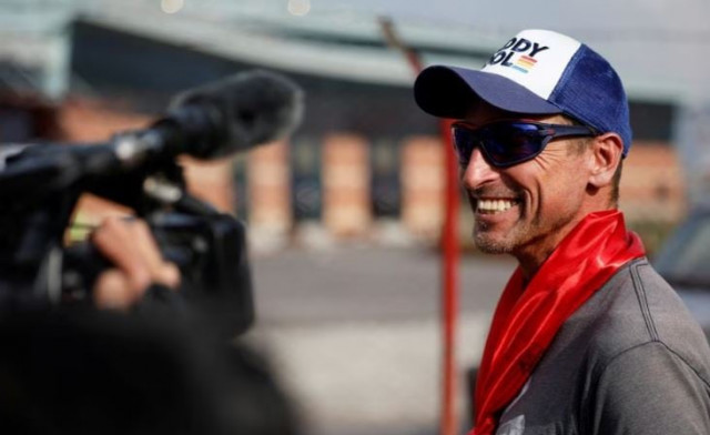 british climber kenton cool 49 smiles while he speaks with the media personnel upon his arrival at the airport as he returns after completing his 17th ascent of mount everest which is the most by any foreign climber in kathmandu nepal may 19 2023 photo reuters