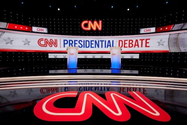 cnn logo is seen on stage set for the first 2024 debate between joe biden and former donald trump in atlanta georgia us june 26 2024 photo reuters