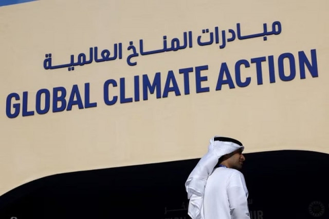 a man attends the first day of un s cop28 climate summit in dubai united arab emirates november 30 2023 photo reuters
