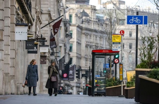 two women walk down regent street one of london s main shopping streets as britain continues its third covid 19 lockdown in london britain january 17 2021 photo reuters