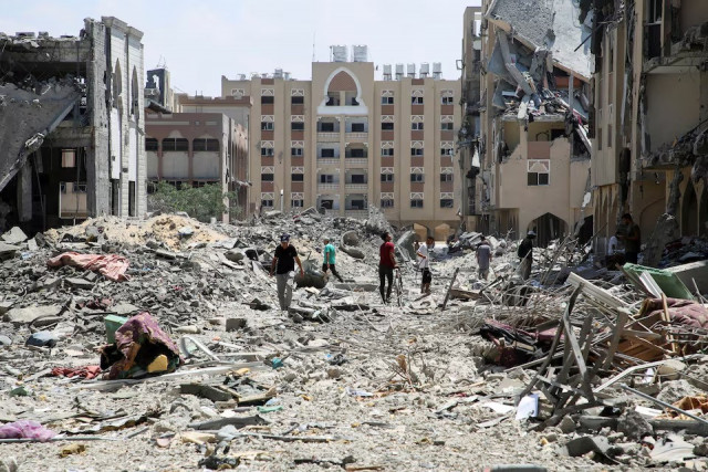 palestinians inspect damage qatari funded hamad city following an israeli raid in khan younis in the southern gaza strip on august 24 2024 photo reuters palestinians inspect damage qatari funded hamad city following an israeli raid in khan younis in the southern gaza strip on august 24 2024 photo reuters
