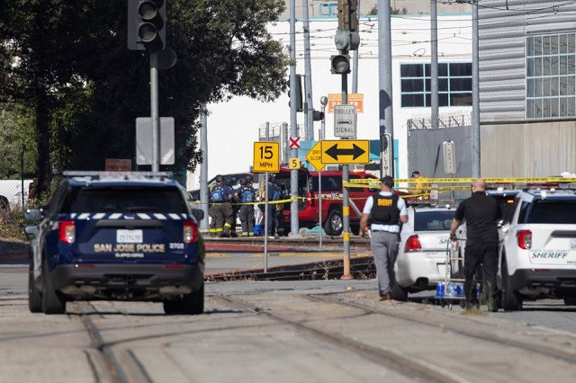 police secure the scene of a mass shooting at a rail yard run by the santa clara valley transportation authority in san jose california us may 26 2021 photo reuters