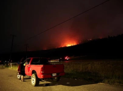wildfires force thousands to flee in canada as evacuation orders triggered