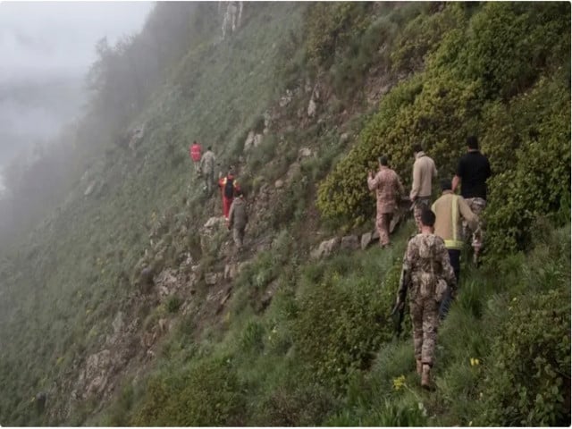 rescue team works following a crash of a helicopter carrying iran s president ebrahim raisi in varzaqan east azerbaijan province iran may 20 2024 reuters