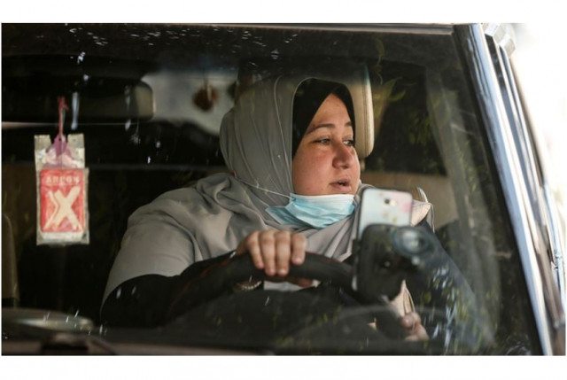 nayla abu jubbah 39 sits at her vehicle as she works in gaza city on november 17 2020 afp nayla abu jubbah 39 sits at her vehicle as she works in gaza city on november 17 2020 afp