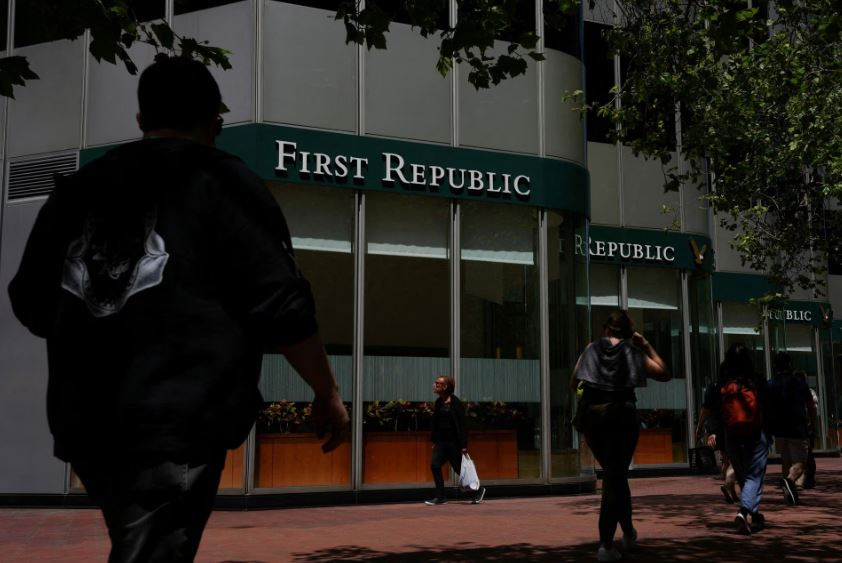 people walk past a first republic bank branch in san francisco california u s april 28 2023 photo reuters