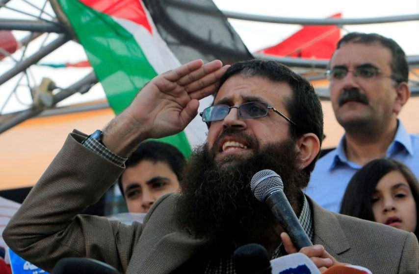 palestinian islamic jihad leader khader adnan gestures as he speaks during a rally honoring him following his release near the west bank city of jenin july 12 2015 photo reuters