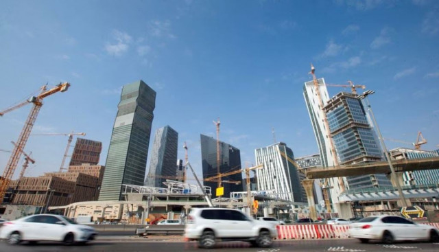 cars drive past the king abdullah financial district in riyadh saudi arabia november 12 2017 photo reuters cars drive past the king abdullah financial district in riyadh saudi arabia november 12 2017 photo reuters