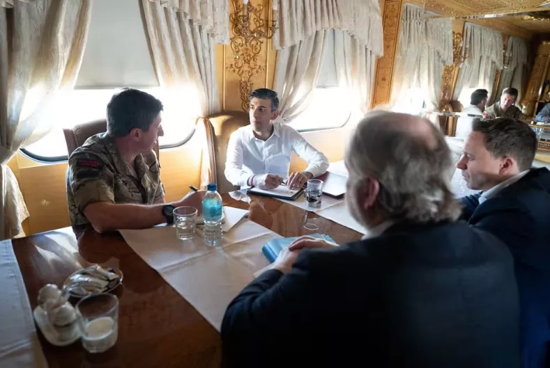 british prime minister rishi sunak speaks with vice chief of the defence staff major general gwyn jenkins as they travel by train through ukraine to meet with president volodymyr zelenskiy after announcing a major new package of 2 5 billion in military aid to the country over the coming year in kyiv ukraine january 12 2024 stefan rousseau pool via photo reuters british prime minister rishi sunak speaks with vice chief of the defence staff major general gwyn jenkins as they travel by train through ukraine to meet with president volodymyr zelenskiy after announcing a major new package of 2 5 billion in military aid to the country over the coming year in kyiv ukraine january 12 2024 stefan rousseau pool via photo reuters