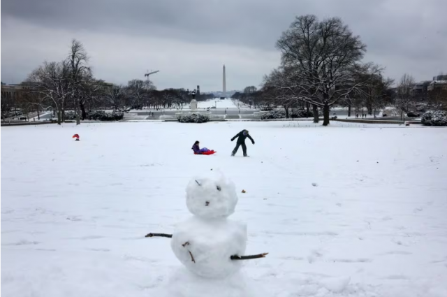 people sled on a hill outside of the u s capitol building looking towards the national mall in washington u s january 16 2024 photo reuters people sled on a hill outside of the u s capitol building looking towards the national mall in washington u s january 16 2024 photo reuters