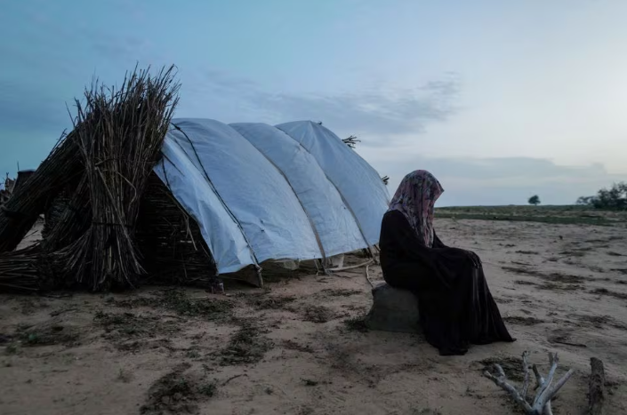 a 15 year old victim of sexual violence in el geneina west darfur is seen outside a makeshift shelter in adre chad august 1 2023 photo reuters