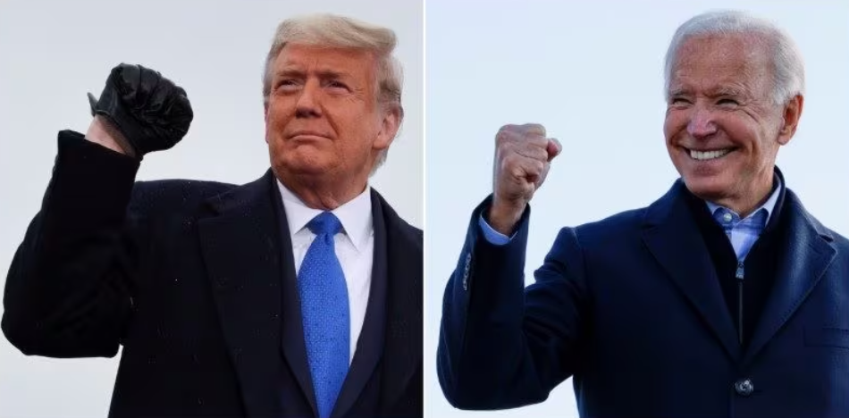 a combination picture shows u s president donald trump pumping his fist during a campaign event at capital region international airport in lansing michigan u s oct 27 2020 and democratic u s presidential nominee and former vice president joe biden making a fist during a drive in campaign stop in des moines iowa u s oct 30 2020 photo reuters