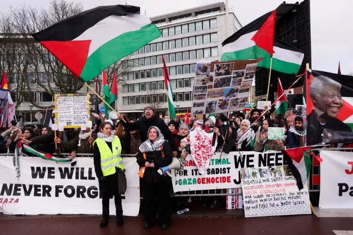 pro palestinian protesters gather near the international court of justice icj on the day judges hear a request for emergency measures by south africa to order israel to stop its military actions in gaza in the hague netherlands january 12 2024 photo reuters pro palestinian protesters gather near the international court of justice icj on the day judges hear a request for emergency measures by south africa to order israel to stop its military actions in gaza in the hague netherlands january 12 2024 photo reuters