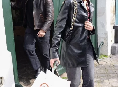 dua lipa and callum turner s stylish parisian date night in paris