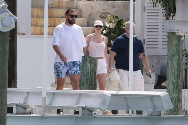 photos of taylor swift and travis kelce holding hands on bahamas getaway revealed photos of taylor swift and travis kelce holding hands on bahamas getaway revealed