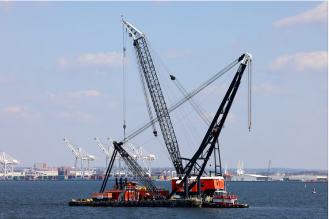 large cranes in the patapsco river near the collapsed francis scott key bridge in baltimore maryland u s march 29 2024 large cranes in the patapsco river near the collapsed francis scott key bridge in baltimore maryland u s march 29 2024